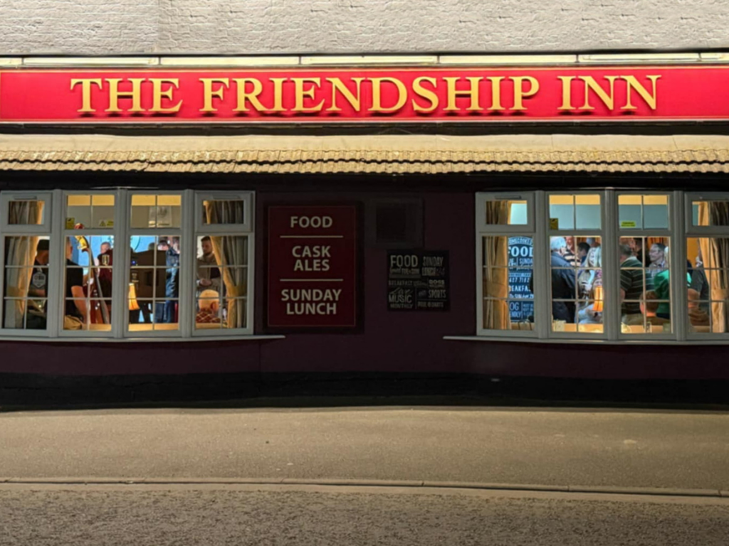 The Friendship Inn at night